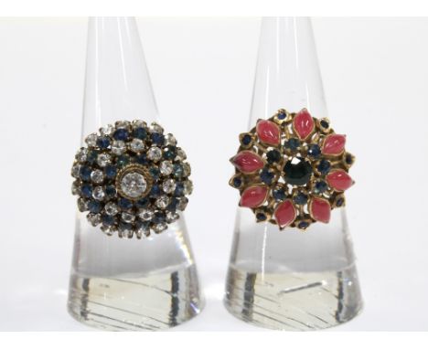 A vintage gemset dress ring with blue and orange cabochons, stamped 18k, together with a dress ring with indistinct makrs (2)