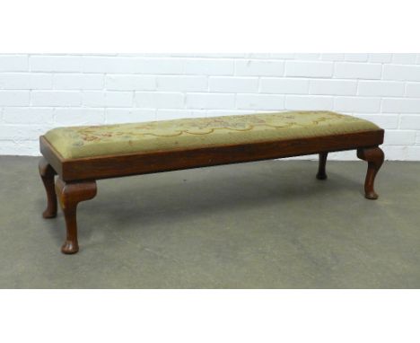 Oak long footstool, tapestry top and short cabriole legs, 115 x 29 x 33cm.