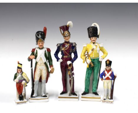 Three Sitzendorf porcelain soldiers, and three smaller figures in military attire,  tallest 23cm (5)