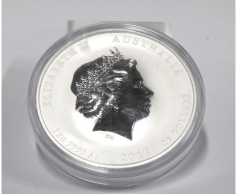 A 2017 Australian $30 1kg 9999 grade silver 'coin', Year of the Rooster, encapsulated.