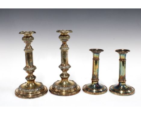 A pair of knop stemmed silver plated candlesticks, 24cm tall and a pair of silver plated telescopic candlesticks, (4)