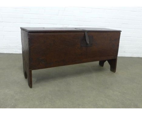 Antique oak sword chest / coffer,  with hinged top and cut out end supports, 113 x 56 x 35cm.