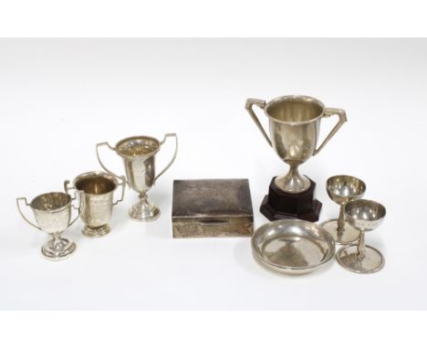 Collection of small silver trophies, tallest 13cm, together with two silver pin dishes and a silver box (9)