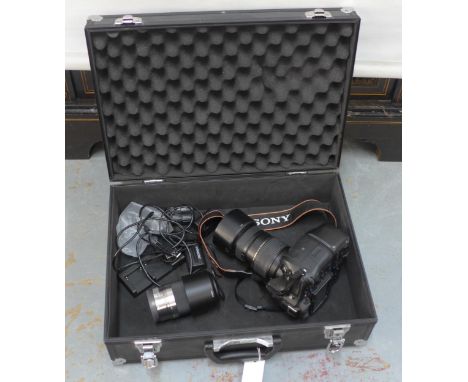 Metal case containing a Sony A77II with a Sony 4.5-6.3/ 55-210 and a Tamron 70-300mm / 1:4-5.6 lens