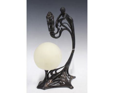 Art Nouveau style table lamp with a circular hard plastic shade, battery operated