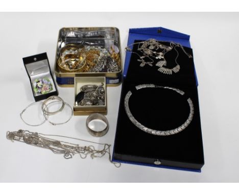 Modern silver and costume jewellery to include a quantity of silver chains, napkin ring and brooches, etc