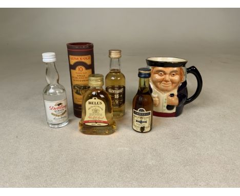Five miniature bottle of alcohol and a Shorter &amp; Son jug. Alcohol includes: Dettling cherry, Glenmorangie scotch whisky 1