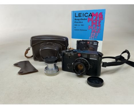 A Leica M6 camera with Leica rangefinder practise M6 to M1 book by Andrew Mathewson, a alternative Ernest Leitz GmbH Wetzlar 