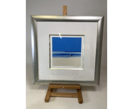 A John Horsewell limited edition print 50 of 60 signed in pencil. Beach scene in silvered frame. Print size W:28cm x H:29cm f