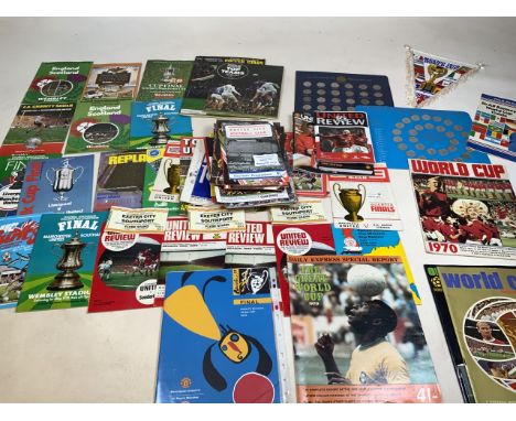 A large collection of football programmes to include United Review from 1960-80s, England vs Scotland 1977, Cup Final Arsenal