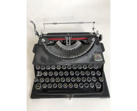 An Imperial Good Companion standard model portable typewriter, cases with instruction booklet I working order. Printed with r