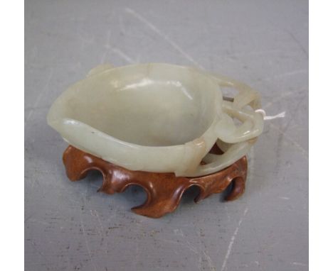 Carved jade Chinese brush washer as a lotus leaf on carved hardwood stem