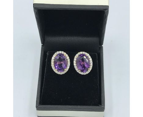 Pair of 18ct yellow gold amethyst &amp; diamond earrings of 8.2cts 