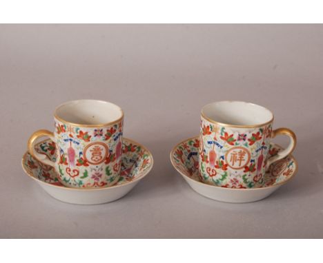 Pair of C19th Chinese famille rose cups and saucers, painted with four medallions enclosing Jixiang Ruyi, separated by scroll