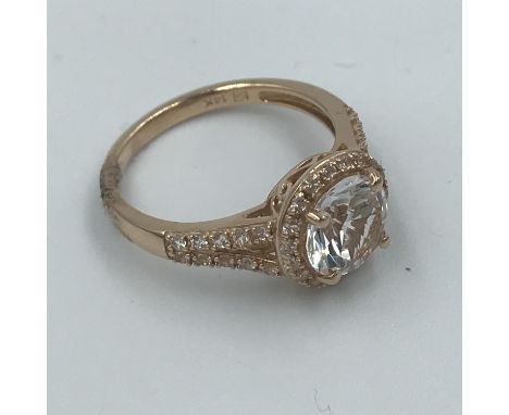 14ct Rose gold ring set with large white sapphire 