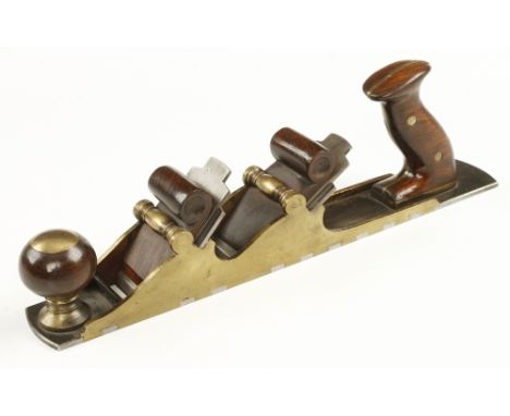 A most unusual, German double iron brass panel plane with d/t steel sole 15" x 2 1/4" with rosewood wedges and rosewood scale