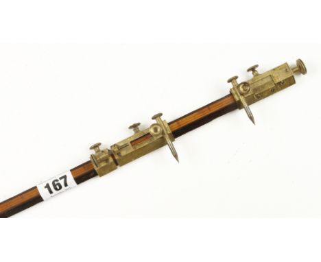 A rosewood and boxwood beam compass with brass fittings by TROUGHTON &amp; SIMMS G