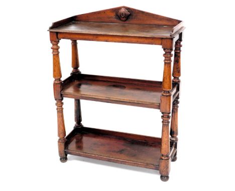 A Victorian mahogany buffet, the galleried top over two shelves, united by turned columns, raised on bun feet, 100cm high, 76