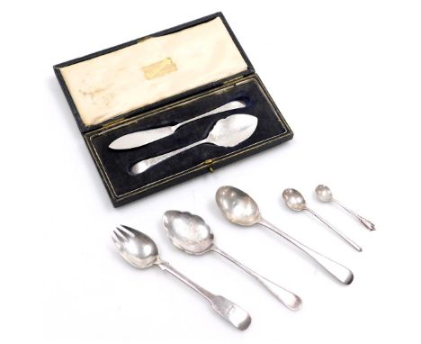 A 19thC silver cold meat serving fork, stamped sterling, Victorian silver teaspoon, two salt spoons, George V silver jam spoo