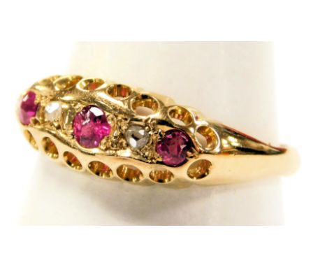 A Victorian gold ruby and diamond fire stone ring, hallmarks indistinct, size N, 2.4g.