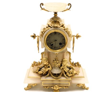 A late 19thC French alabaster and ormolu mantel clock, circular dial bearing Roman numerals, eight day movement by Vincent &a