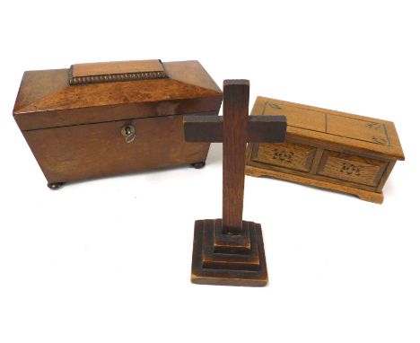 A Regency mahogany sarcophagus tea caddy,  raised on bun feet, with key, 22.5cm wide, (AF), together with a Tallent musical j
