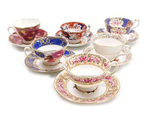 Six late 19thC and later tea cups and saucers, including Coalport, Old Country Roses Ruby Lace, and a cup and saucer printed 