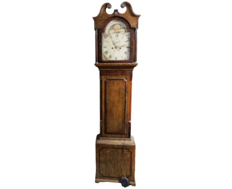 A Georgian oak and mahogany longcase clock, the break arch dial with moon phase aperture, chapter ring bearing Roman numerals