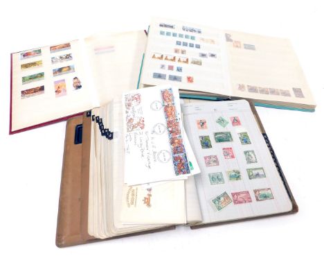 Philately.  GB, Commonwealth and World stamps, in three albums, together with first day covers, etc.  (a quantity)