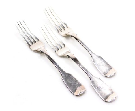 A pair of Victorian silver table forks, crest engraved, Lister &amp; Sons, Newcastle 1863, and a further fork, Reed &amp; Son