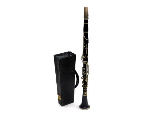 An early 20thC Army and Navy Co Society clarinet, cased.