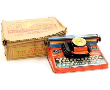 A Mettype Junior tin plate toy typewriter, boxed.