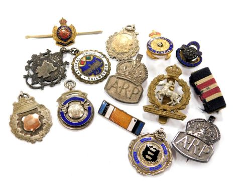 A silver Special Constabulary medallion, four further silver medallions, two silver ARP badges, a National Union of Railway M
