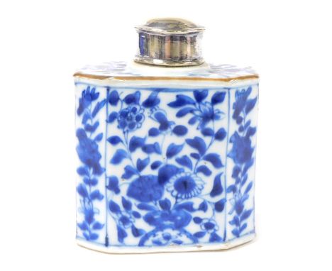 A Kangx porcelain blue and white tea caddy, with white metal lid, of canted rectangular form, decorated with flowers, 11cm hi