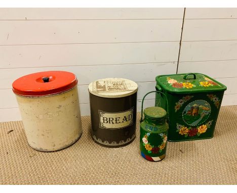 A selection of metal vintage bread bins and urns 
