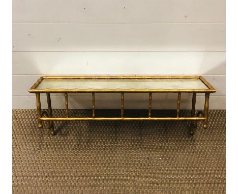 A gold coloured metal cane effort wall shelf aged mirror shelf (65cm x 19cm)