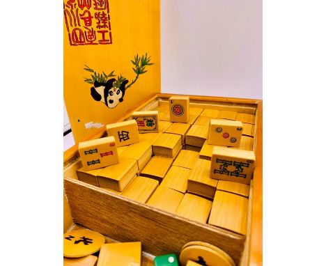 A Vintage Mahjong Set with four vintage tile rests.
