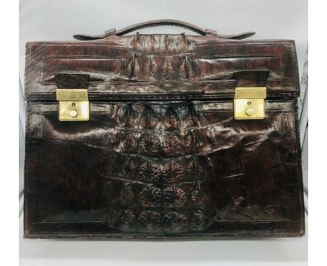A vintage rich brown leather briefcase, very likely crocodile or alligator in excellent condition 