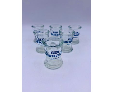 A set of six gin shot glasses 