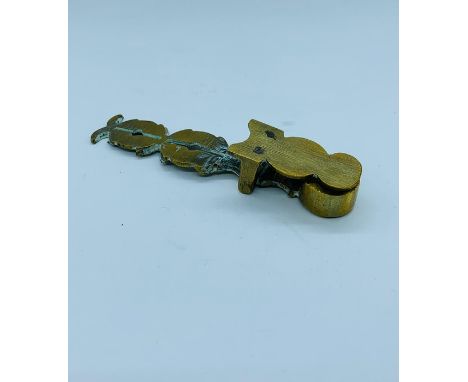 A brass set of Sovereign scales.