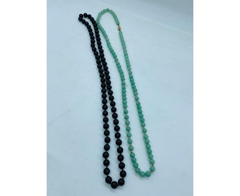 A Vintage Jade Necklace and an Onyx Necklace