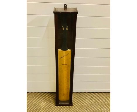 A vintage cased cricket bat signed by the Sussex team including Ted Wexton etc