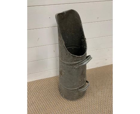 A vintage metal coal scuttle 