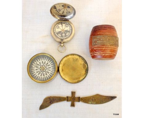 A 1915 dated officers pocket watch compass made by Koehn of Geneva with another compass - a small barrel made from the teak o