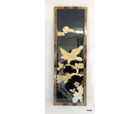 A lacquer and mother of pearl panel depicting birds