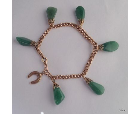 A 9ct gold bracelet with Jade