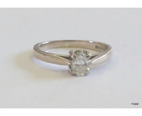 An 18ct white gold diamond solitaire  approx 0.33 ct size K