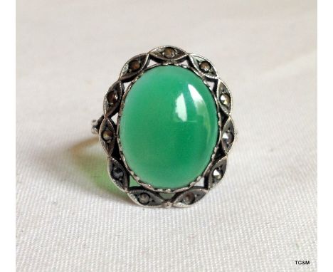 A silver and jade ladies ring, size N