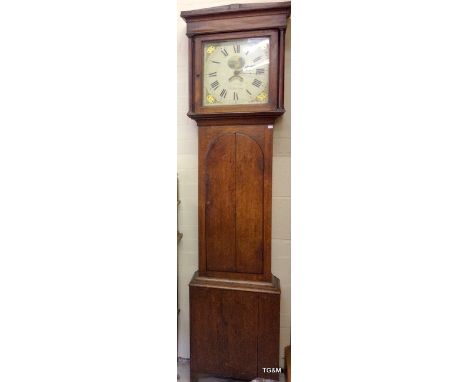 An oak cased 30 hour long cased clock with enamel dial with a makers name to the front Salisbury Goddards comes complete with