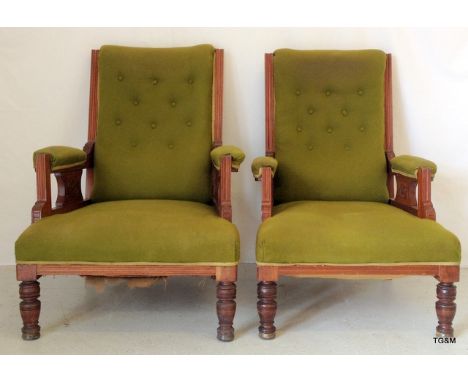 A pair of Edwardian button back fire side chairs